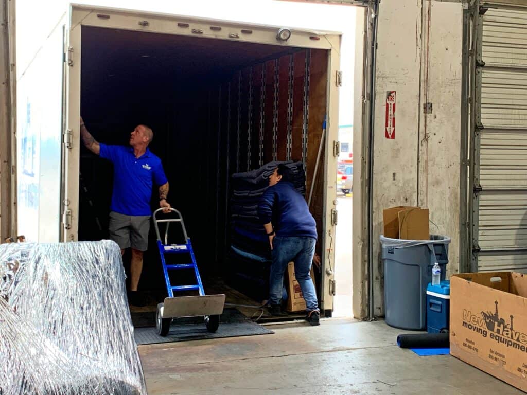 Blue Ox crew loading a moving truck in Houston