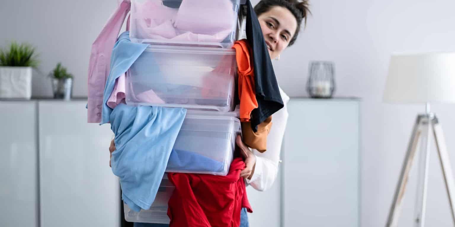 woman-with-pile-of-clothes
